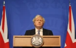 Le Premier ministre britannique Boris Johnson lors d'une conférence de presse, le 8 décembre 2021 à Londres