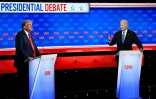 Donald Trump (g) et Joe Biden lors d'un débat sur CNN, le 27 juin 2024 à Atlanta, en Géorgie