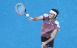 L'Américain Taylor Fritz contre le Serbe Novak Djokovic en quart de finale de l'Open d'Australie le 23 janvier 2024 à Melbourne