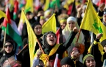 Des partisans du Hezbollah rassemblés pour regarder un discours télévisé de son chef Hassan Nasrallah dans la banlieue sud de Beyrouth, le 3 novembre 2023 au Liban