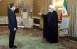Le président iranien Hassan Rohani reçoit le ministre chinois des Affaires étrangères, le 27 mars 2021 à Téhéran