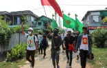 Photo diffusée le 23 mars 2021 par Dawei Watch de manifestants opposés au coup d'Etat militaire dans une rue de Dawei, en Birmanie