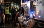 Des civils et rebelles évacués de Douma, dans la Ghouta orientale prÚs de Damas, à Qalaat al-Madiq le 2 avril 2018