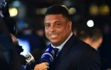 L'ex-star brésilienne Ronaldo, interrogée par les reporters à Londres, le 23 octobre 2017, a investi dans son ancien club de Cruzeiro