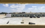 Vue de la cour d'un Centre d'Accueil Temporaire des Etrangers (CATE) à Nouadhibou, le 23 avril 2026.