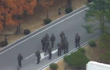 Capture d'image d'une vidéo fournie par le Commandement des Nations Unis en Corée montrant un groupe de soldats nord-coréens après la défection d'un militaire nord-coréen vers la Zone démilitarisée, le 22 novembre 2017