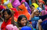 Des ouvriers du textile du Bangladesh manifestent pour réclamer des hausses de salaire, le 9 janvier 2019 à Dacca
