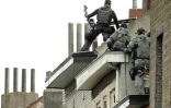 Les forces spéciales belges en intervention à Molenbeek, en Belgique le 16 novembre 2015