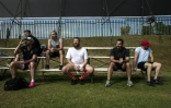 Les rugbymen des Jozi Cats se reposent après l'entraînement le 21 mai 2016 à Johannesburg