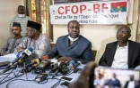 Les candidats Tahirou Barry (à gauche), Albasse Ouedraogo (au centre) et Zéphirin Diabré (à droite) donnent une conférence de presse à Ouagadougou, le 21 novembre 2020
