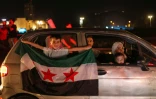 Des familles syriennes célèbrent l'annonce de Donald Trump d'une levée des sanctions américaines, à Damas le 13 mai 2025.

