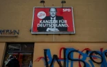 Une affiche électorale montre le ministre des Finances, vice-chancelier et candidat social-démocrate, Vice-Chancellor, Olaf Scholz, à Berlin le 22 septembre 2021
