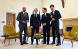 Emmanuel Macron en compagnie des Premier ministres belge Charles Michel, luxembourgeois Xavier Bettel, et néerlandais Mark Rutte, lors d'une conférence de presse au Luxembourg le 6 septembre 2018
