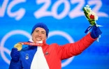 Quentin Fillon Maillet, médaillé d'or en poursuite aux Jeux de Pékin, le 13 février 2022 au centre national de biathlon à Zhangjiakou  