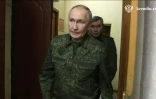 Image tirée d'un document diffusé par le Kremlin,le 12 mars 2025, montrant le président russe Vladimir Poutine en visite dans un point de commandement des troupes de Koursk impliquées dans la contre-offensive russe dans la région