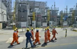 Des employés d'Aramco sur le site de Khurais, le 20 septembre 2019