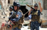 Des forces irakiennes lors de l'offensive pour reprendre la vieille ville de Mossoul aux jihadistes de l'EI, le 18 juin 2017