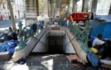 Des migrants installés près de la station de métro Jean Jaurès à Paris le 19 juillet 2016