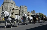 Le carrosse destiné au mariage samedi du prince Harry et de l'actrice américaine Meghan Markle lors d'une répétition devant le château de Windsor, le 17 mai 2018.