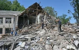 Bâtiment administratif en ruine, à Lyubotyn, dans la région de Kharkiv (est de l'Ukraine) le 20 juin 2022 après une frappe de roquette russe
