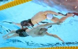 Vue sous-marine du Français Maxime Grousset lors d’une série du 100 m nage libre aux Championnats du monde, à Singapour, le 30 juillet 2025