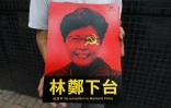 La cheffe de l'exécutif hongkongais, Carrie Lam, représentée sur une affiche tenue par un participant à la manifestation contre un projet de loi d'extradition, le 9 juin 2019