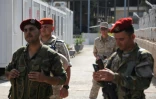Soldats syriens et russes dans la base navale russe dans le port de Tartous, le 26 septembre 2019