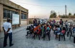 Des enfants kurdes lors de la projection d'un film de cinéma en Syrie, le 28 juillet 2019 à Sanjak Saadoun