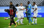 La joie du capitaine et gardien de but Steve Mandanda et des coéquipiers marseillais, après leur victoire (3-2) face à l'OGC Nice, le 17 février 2021 au stade Vélodrome