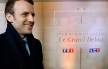 Emmanuel Macron à son arrivée pour le débat sur le plateau de TF1, le 20 mars à Aubervilliers