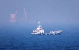 Des navires près du détroit d'Ormuz, au large de la côte orientale des Émirats arabes unis, le 13 juillet 2026à Khor Fakkan,