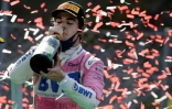 Le Canadien de l'équipe Racing Point Lance Stroll sur le podium du GP d'Italie 2020, qu'il a terminé à la 3e place, à Monza, le 6 septembre 2020.