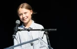 La jeune militante suédoise Greta Thunberg s'exprime à la tribune lors d'une marche pour le climat à Montréal qui a rassemblé près de 500.000 personnes selon les organisateurs, le 27 septembre 2019