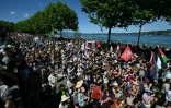 Des manifestants participent à un rassemblement organisé par la coalition "No-G7", qui regroupe plus de 60 associations, syndicats et groupes de gauche, le 14 juin 2026 à Genève, à la veille de l'ouverture du sommet près d'Evian, dans l'est de la France
