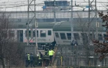 Les secours sur les lieux de l'accident de train près de Milan, le 25 janvier 2018