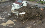 Vue aérienne des inondations causées par de fortes pluies à Mucum, dans l'État du Rio Grande do Sul, au Brésil, le 10 mai 2024.
