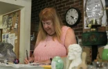 Beth Curtin, propriétaire d'un magasin d'antiquités à Berkeley Springs, en Virginie-Occidentale, le 31 juillet 2025