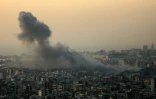 De la fumée s'élève au dessus de la banlieue sud de Beyrouth après une frappe israélienne, le 6 novembre 2024