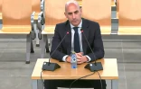 Image tirée d'une vidéo publiée par la chaîne YouTube de la Cour de justice  espagnole de l'ancien président de la fédération espagnole de football Luis Rubiales, lors de son procès au tribunal de San Fernando de Henares, à l'est de Madrid, le 11 février 2025