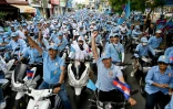 Des partisans du Parti du peuple cambodgien (PPC) au pouvoir participent à un meeting de campagne en vue des prochaines élections à Phnom Penh, le 1er juillet 2023