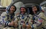(De G à D) Thomas Pesquet, Oleg Novitsky et Peggy Whitson devant un Soyuz à la Cité des Etoiles, près de Moscou, le 25 octobre 2016