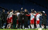 La joie des joueurs du Slavia Prague, vainqueurs des Glasgow Rangers (2-0) et qualifiés pour les quarts de finale de la Ligue Europa, le 18 mars 2021 à l'Ibrox Stadium à Glasgow