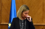 La chef de la diplomatie européenne Federica Mogherini pleure après avoir appris la nouvelle des attentats de Bruxelles pendant une conférence de presse conjointe avec le ministre jordanien des Affaires étrangères le 22 mars 2016 à Amman