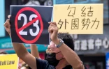 Rassemblement à Taipei, le 23 mars 2024, contre la nouvelle loi de Hong Kong sur la sécurité nationale prévoyant des peines de prison à perpétuité pour la trahison ou l'insurrection