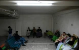Des habitants réfugiés dans un abri improvisé dans un garage à Stepanakert, le 1er octobre 2020