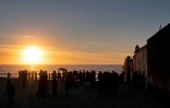 Des migrants d'Amérique centrale devant la frontière des Etats-Unis sur la plage de Tijuana, Mewique, le 14 novembre 2018
