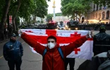 Manifestation contre le projet de loi controversé sur "l'influence étrangère" près du parlement à Tbilissi, le 13 mai 2024 en Géorgie