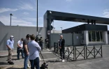 Les reporters attendent l'arrivée des joueurs de la Juventus à l'entrée du centre d'entraînement du club à Turin, le 5mai 2020