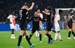 La joie des joueurs de Benfica, qualifiés pour les quarts de finale de la Ligue des champions, après leur victoire, 1-0 face à l'Ajax Amsterdam (match aller 1-1), le 15 mars 2022 à la Johan Cruijff ArenA