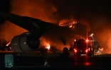 Avion de la Japan Airlines en feu sur le tarmac de l'aéroport international de Tokyo-Haneda le 2 janvier 2024, après une collision avec un avion des garde-côtes japonais